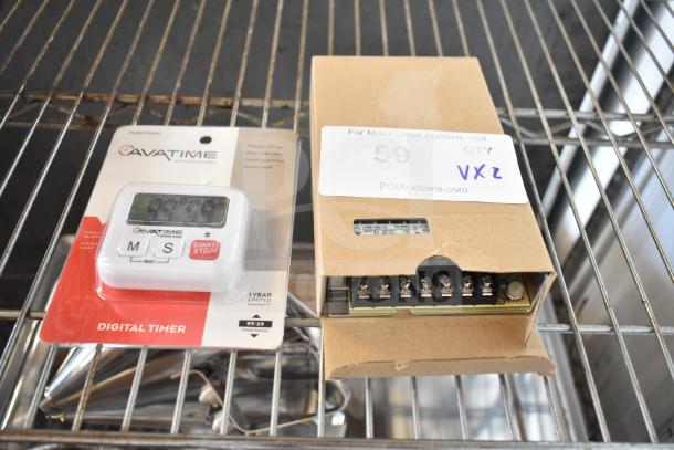 AvaTime Digital Timer in package and Mean Well LRS-150-12 12.5 Amp Power Supply on shelf, cardboard box slightly opened.