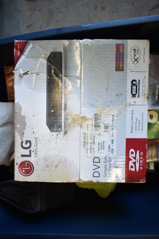 Lot of 2 bins including an LG DVD player and DVDs; box shows wear with visible branding and product details.