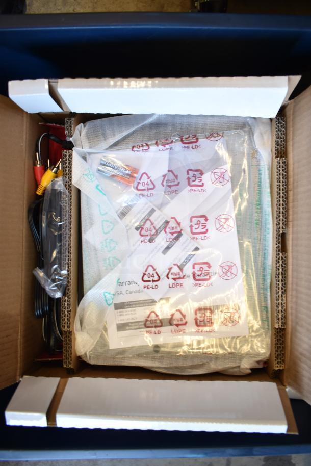 Two bins with an LG DVD player, assorted DVDs; includes cables and accessories. Items appear new in packaging.