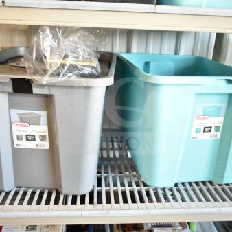 Two bins with various items, including DVDs, on a shelf. One bin is gray, the other teal. Labels indicate "Sterilite 18 Gal".