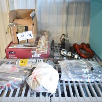 Lot of 12 items including USA Wolf Streak knife, cordless screwdriver, hitch, red shackles, and electrical tape on shelf.