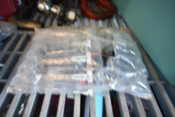 Lot of 12 items including USA Wolf Streak knife, cordless screwdriver, hitch, and electrical tape. Various conditions.