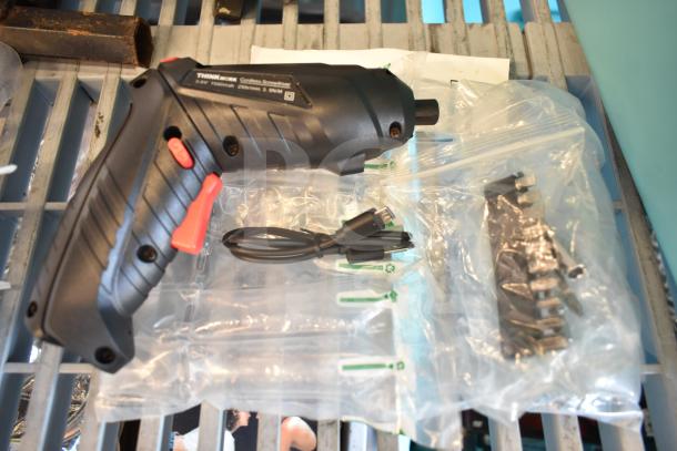 Lot of 12 items including a ThinkWork cordless screwdriver with cable, packaged hitch components, and electrical tape.