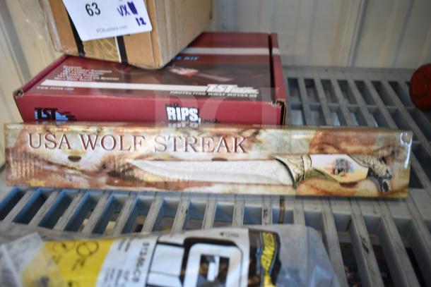 Lot of 12 items including USA Wolf Streak knife in packaging, cordless screwdriver, hitch, electrical tape.