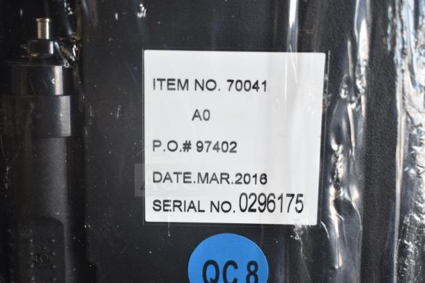 SentrySafe cash box and flat tire repair kit. Includes label with item no. 70041 and serial no. 0296175, dated March 2016.