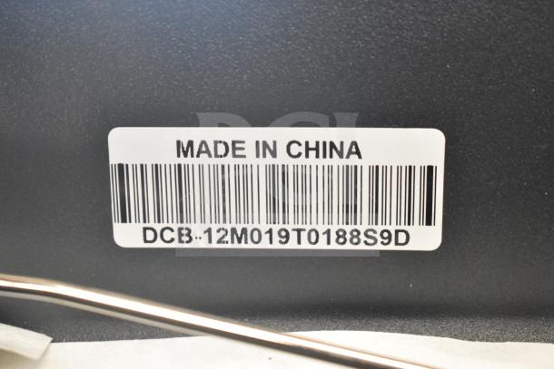 Barcode label reading "Made in China" with item code "DCB-12M019T0188S9D" on auction item.