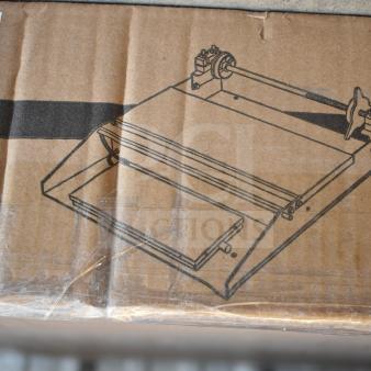 Brand new VacPak-It 186WM18 single 18" roll film wrapping machine in original box, 115V, 1 phase, with UL certification label.