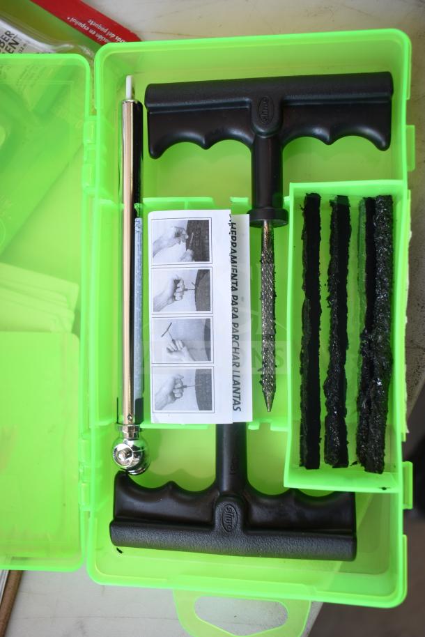 Slime Tube Patch Kit with tools in a green case. Includes tire repair strips, T-handle tools, and instructions.