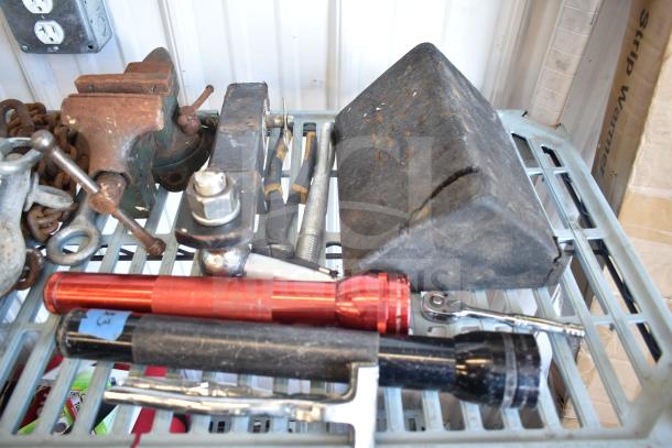 Lot of 30 various items including flashlights, tools, and a hitch, all displayed on a metal shelf. Mixed condition.