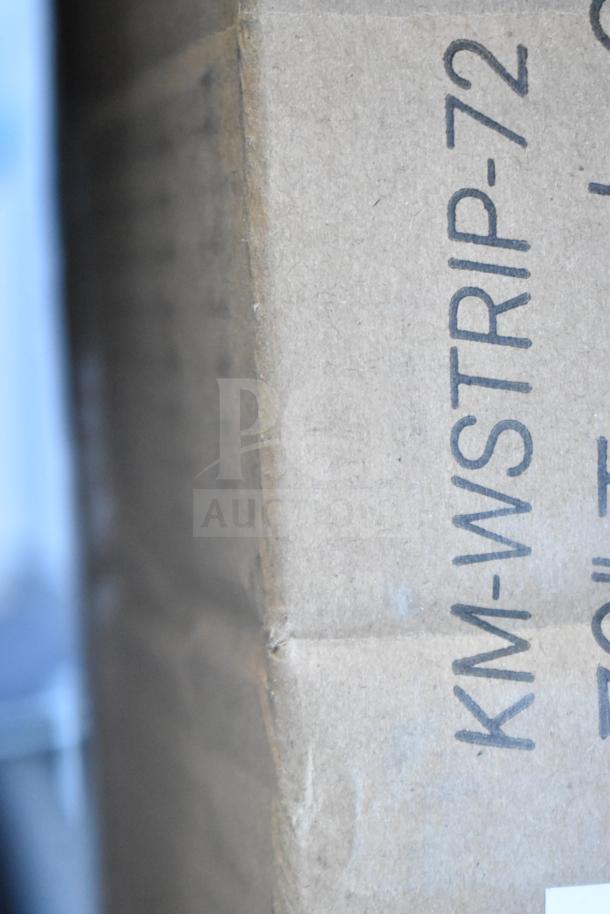 Cardboard box labeled "KM-WSTRIP-72," indicating a new Scratch and Dent KoolMore 72" food strip warmer.