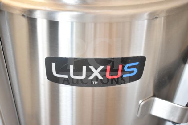 BRAND NEW SCRATCH AND DENT! Fetco TPD-30 Luxus 3 Gallon Coffee Dispenser, stainless steel, visible minor dents.