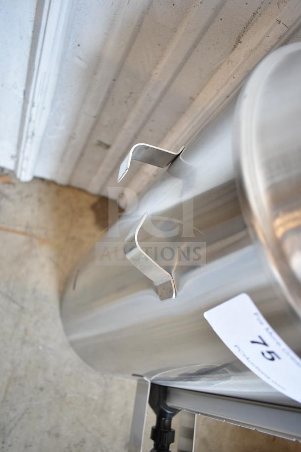 Brand new Fetco TPD-30 Luxus 3-gallon stainless steel coffee dispenser. Scratch and dent condition with visible label.