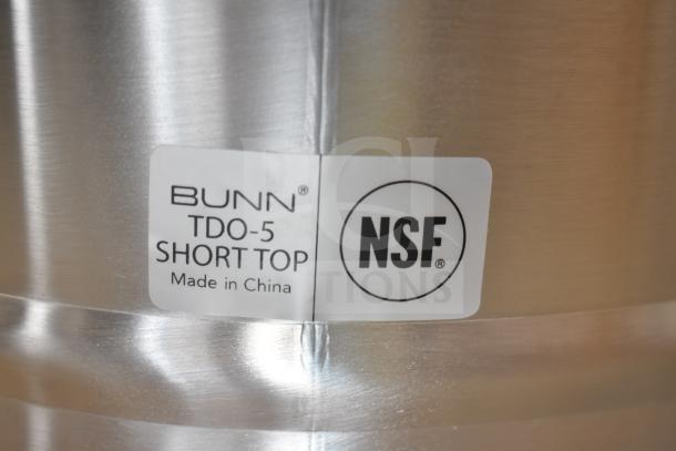 Bunn TDO-5 Iced Tea Dispenser, 5-gallon, solid plastic lid, "Brand New Scratch and Dent" label, NSF certified.