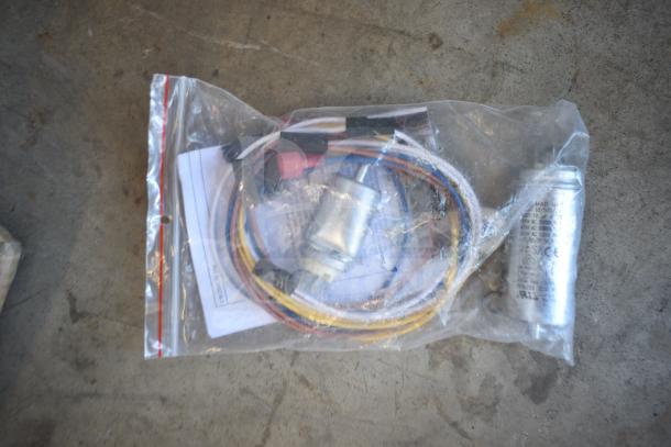 BRAND NEW Moffat M237335K fan motor in sealed bag with wires and capacitor, minor scratch and dent, model 952M237335K.