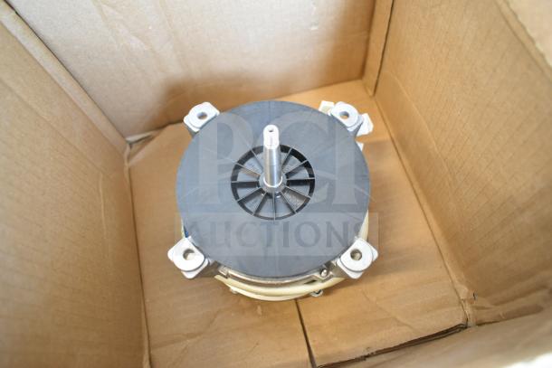 Brand new Moffat M237335K fan motor, 952M237335K model, in pristine condition with minor scratches, in original packaging.
