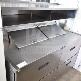 Delfield commercial sandwich salad prep table, stainless steel, mega top, 4 drawers, 115V, 1 phase, clean condition.