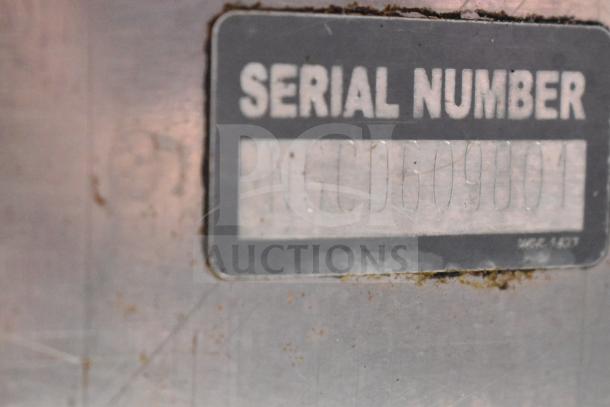 Serial number label on Turbochef NGC Commercial Rapid Cook Oven, electric, 1 phase, 208/230-240V, on equipment stand.