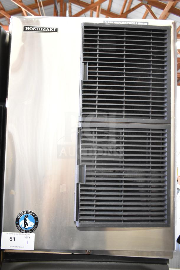 Hoshizaki commercial ice head on Manitowoc B420 bin, stainless steel, good condition, Hoshizaki logo visible.