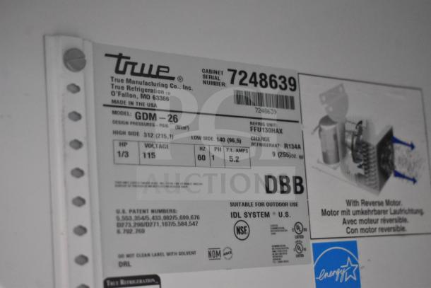 True GDM-26 Commercial Cooler label showing model, 115V, 1 Phase, serial number, refrigerant details, and certifications.