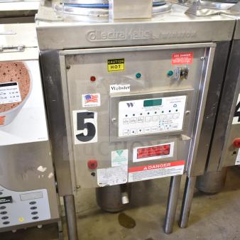 2021 Winston CollectraMatic PF56C11SJ electric pressure fryer, 208V, 1 phase, labels indicating caution and operation instructions visible.