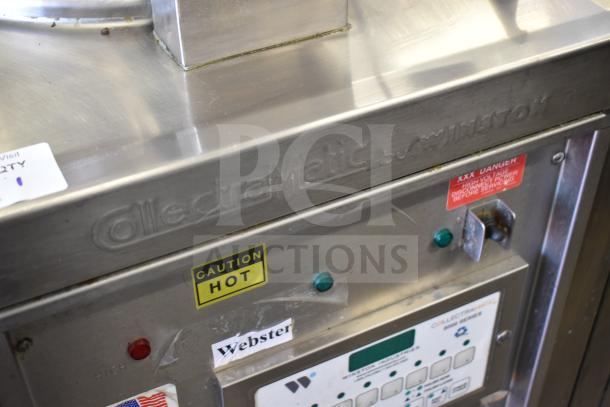 2021 Winston CollectraMatic PF56C11SJ commercial electric pressure fryer with caution and high voltage warning labels.