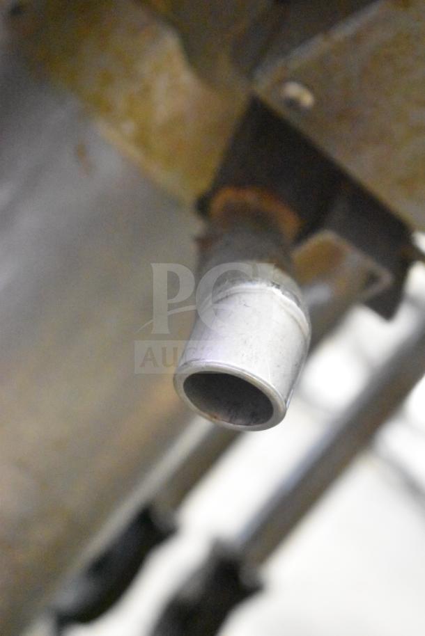 2021 Winston CollectraMatic PF56C11SJ electric deep fat fryer, 208V, 1 Phase. Close-up of outlet tube, good condition.