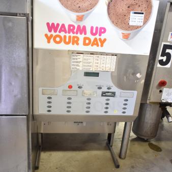 Bunn IMIX-5 commercial cappuccino machine, countertop design, 120/208-240 volts, 1 phase, visible use with flavor options.