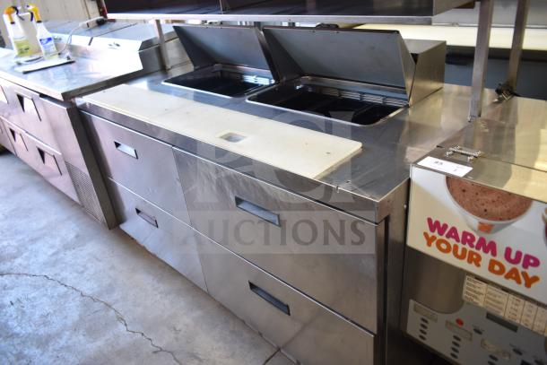 Delfield UCD4464N-12-DD5 prep table, stainless steel, 4 drawers, bain marie top, 115V, 1 phase, good condition.