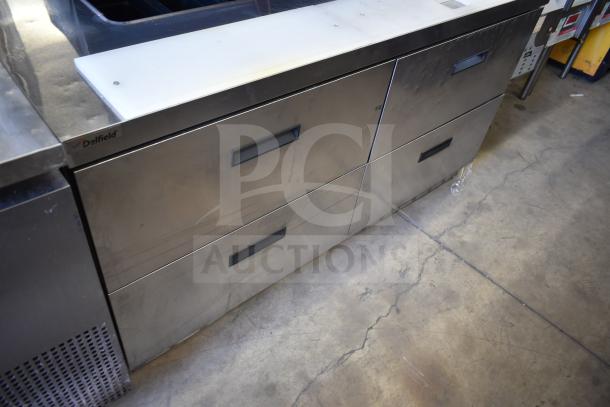 Delfield UCD4464N-12-DD5 prep table with 4 drawers, stainless steel, shows Delfield logo, commercial kitchen use.