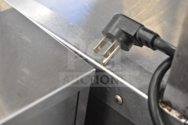 Delfield UCD4464N-12-DD5 commercial prep table plug on stainless steel surface, 115V, 1 Phase.