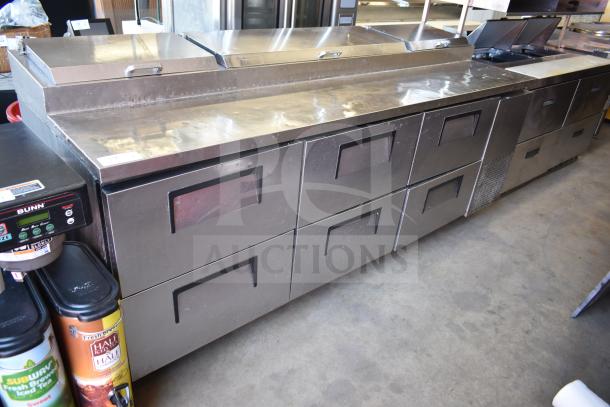 True TPP-93D-6 commercial pizza prep table with 6 drawers, stainless steel, on commercial casters, used condition.
