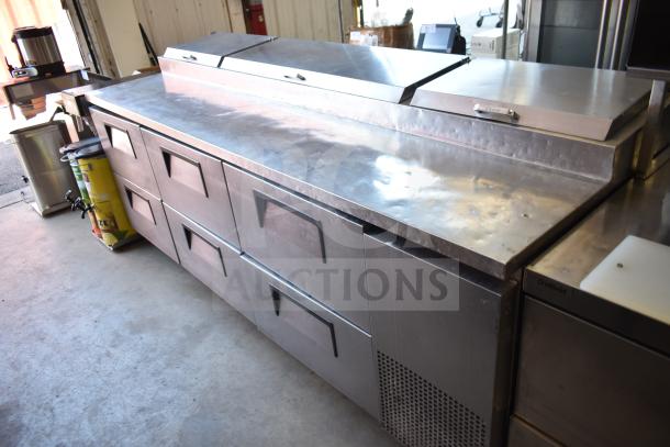 True TPP-93D-6 commercial pizza prep table with 6 drawers on casters, 115 volts, 1 phase, stainless steel, used.