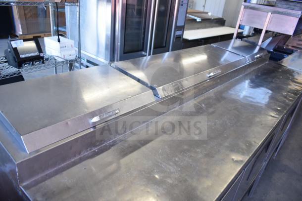 True TPP-93D-6 commercial pizza prep table with 6 drawers, stainless steel, on casters, model TPP-93D-6.