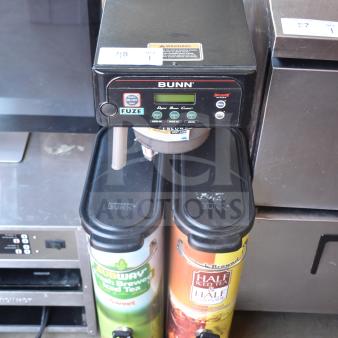 Bunn commercial iced tea machine with two beverage dispensers, 120V, 1 phase, includes control panel and labels for flavors.