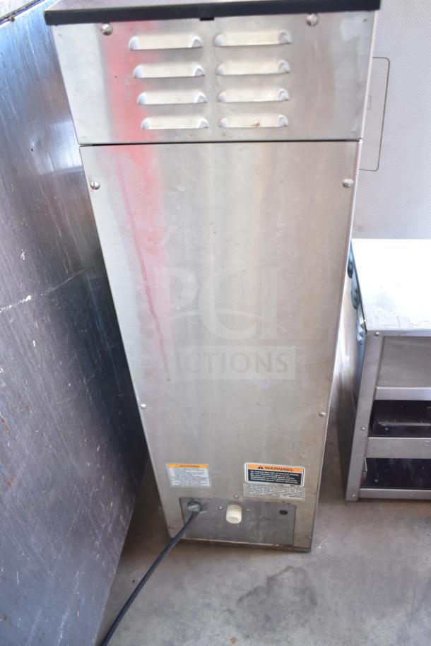 Bunn commercial countertop iced tea machine, stainless steel, with two beverage holder dispensers, 120 volts, 1 phase.