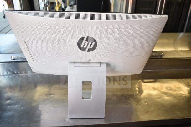 HP All In One Computer, white back panel, integrated stand, HP logo visible. Used condition.