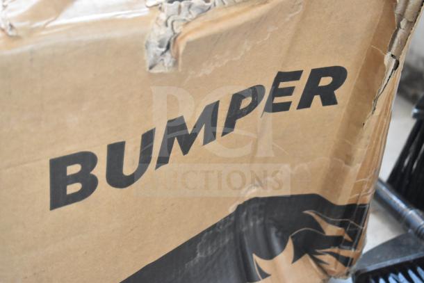 Cardboard box labeled "BUMPER" showing signs of wear and tear, indicating a new VHT auto bumper with scratch and dent.