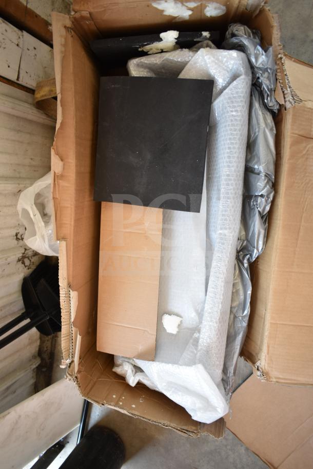 BRAND NEW SCRATCH AND DENT! VHT Auto Bumper in original packaging, partially wrapped in bubble wrap, showing packaging damage.