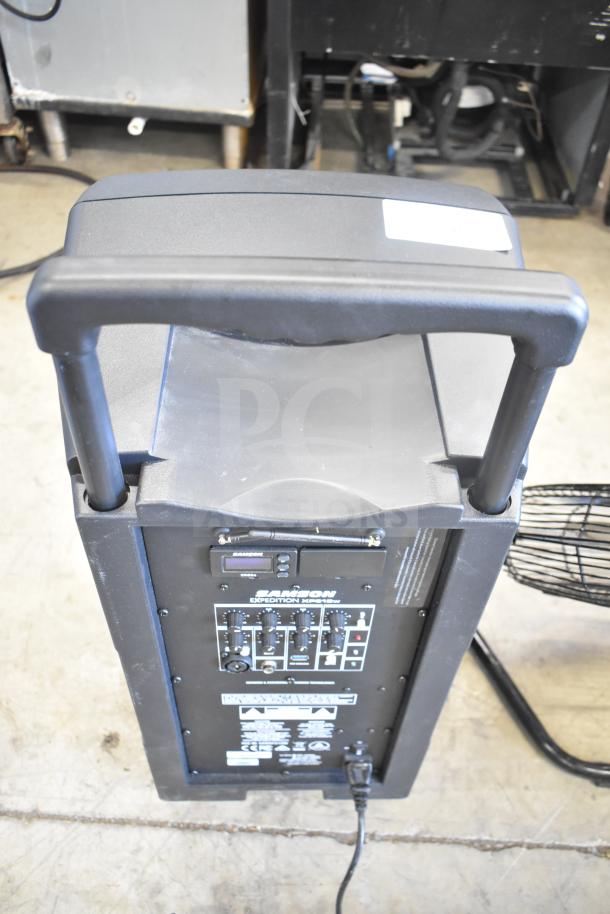 Samson Expedition XP312w Portable PA System, black, control panel visible, features multiple inputs and knobs, used condition.