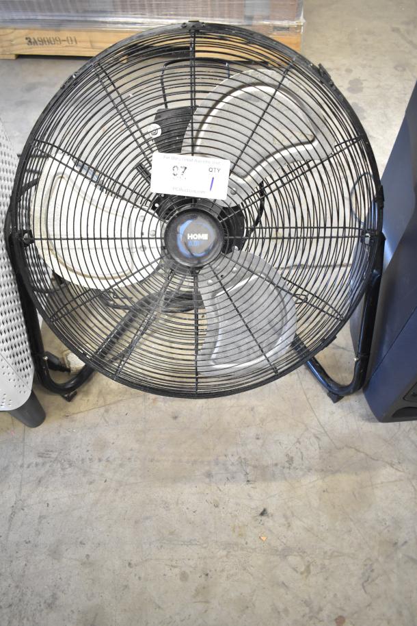 Home Air SZPD-05 fan, 120 volts, 1 phase, black metal frame, large blades, item tag attached.