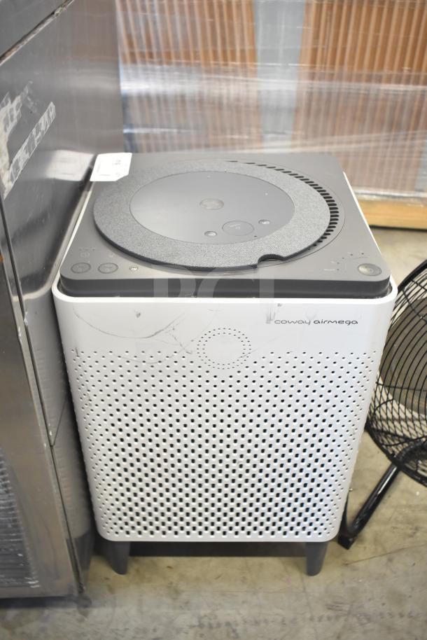 Coway Airmega air purifier, 120 volts, 1 phase. White with top controls and light scratches, model label visible.