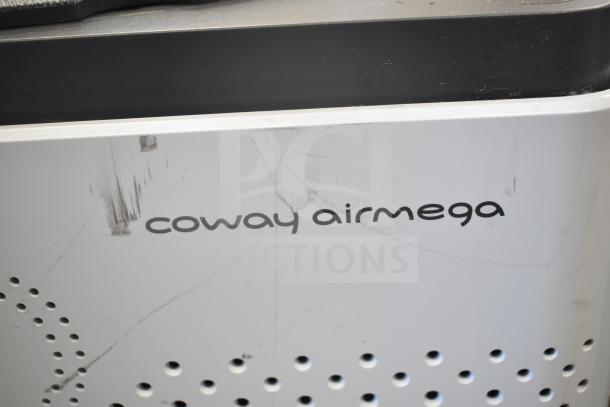 Coway Airmega Air Purifier with visible scratches and markings. 120 Volts, 1 Phase. Brand logo shown.
