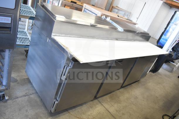 Beverage Air DP93 commercial pizza prep table, stainless steel, three-door, 115 volts, 1 phase, good condition.