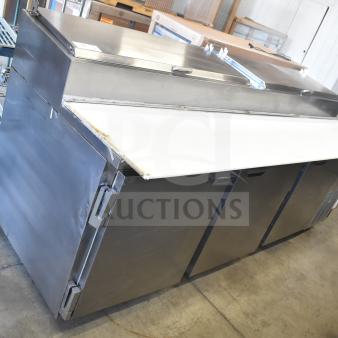 Beverage Air DP93 commercial pizza prep table, stainless steel, three-door, 115 volts, 1 phase, good condition.