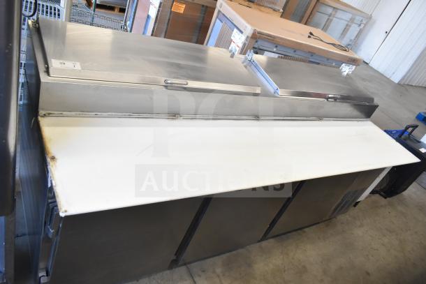 Beverage Air DP93 commercial pizza prep table, stainless steel, 115 volts, 1 phase, with hinged doors and large prep surface.