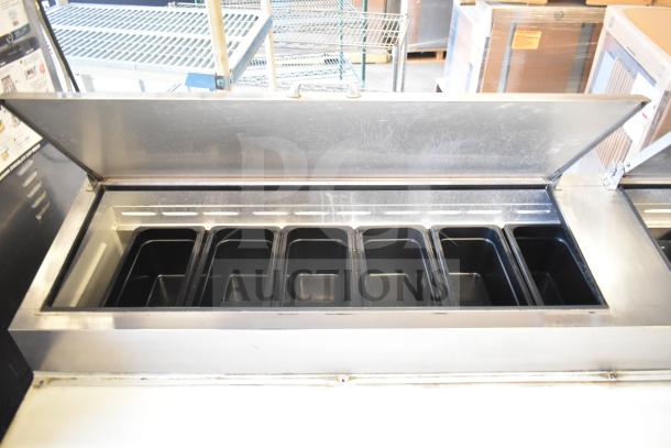 Beverage Air DP93 pizza prep table, stainless steel, six inserts, 115 volts, 1 phase, commercial use, good condition.