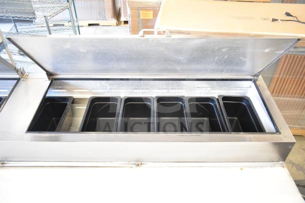 Beverage Air DP93 Commercial Pizza Prep Table, 115V, 1 Phase, stainless steel with multiple ingredient bins, used.