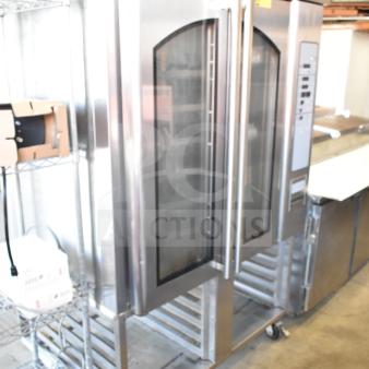 Baxter commercial gas rotating rack oven, double pan rack, stainless steel, on commercial casters, excellent condition.
