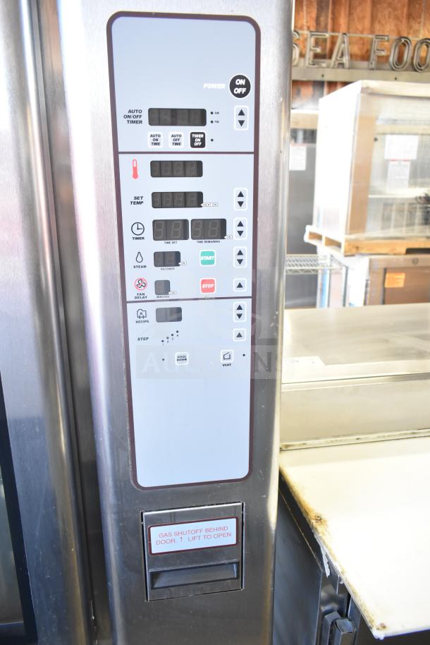 Baxter Commercial Gas Mini Rotating Rack Oven with digital controls, double pan rack on casters, and gas shutoff label.