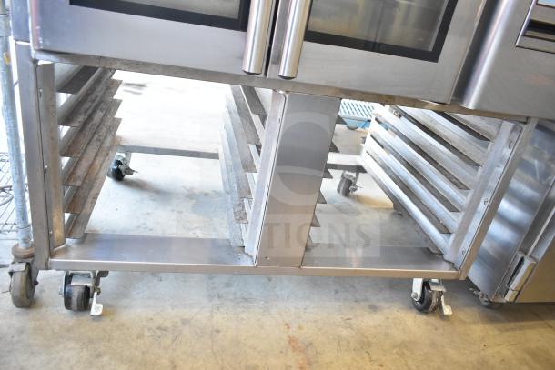 Baxter commercial gas mini rotating rack oven with double pan rack, on commercial casters, stainless steel, used condition.